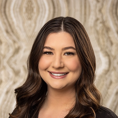 Dental Hygienist Susan Smiling in black scrubs